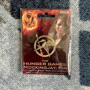 NWT MOCKINGJAY PIN